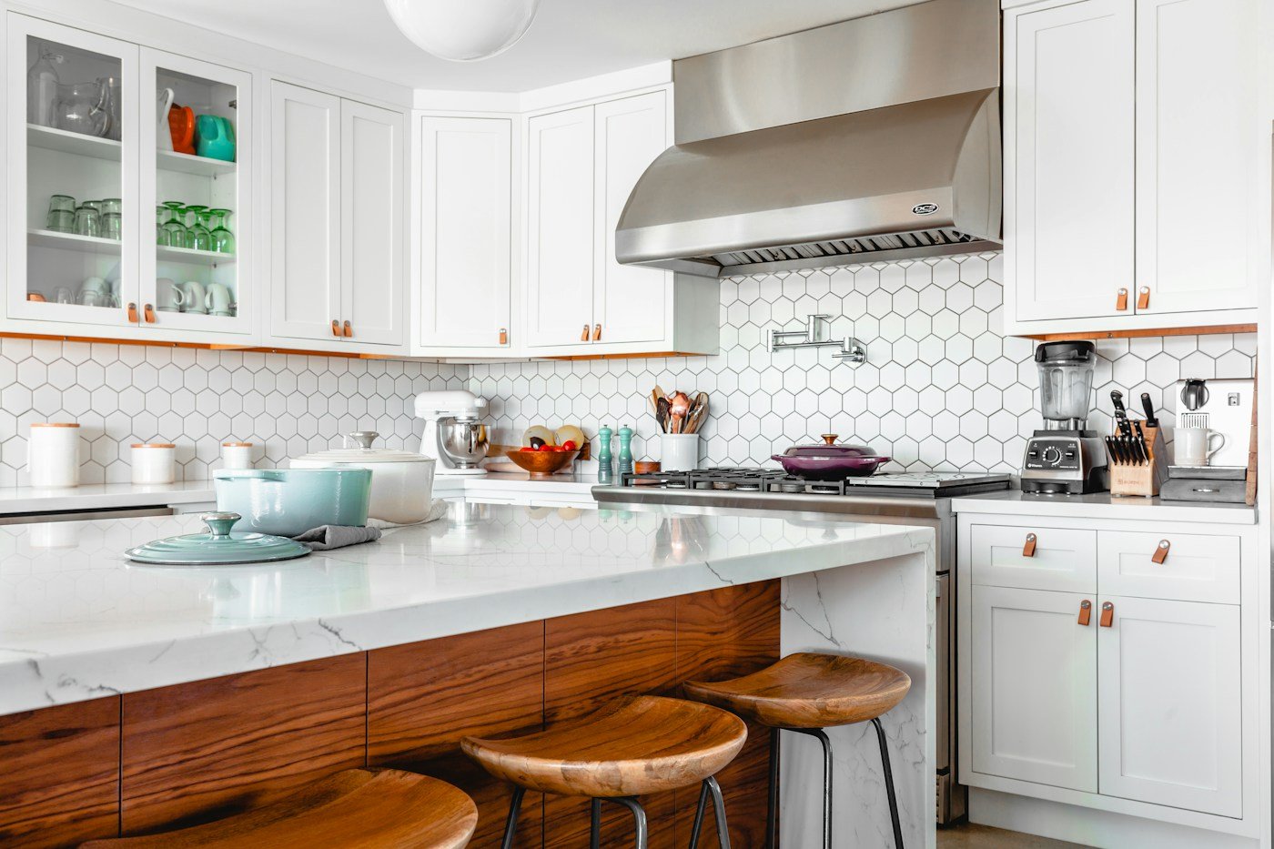 Contemporary kitchen with wood accents and a large central island